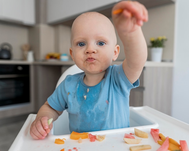 What foods should not be eaten by a seven-month-old baby